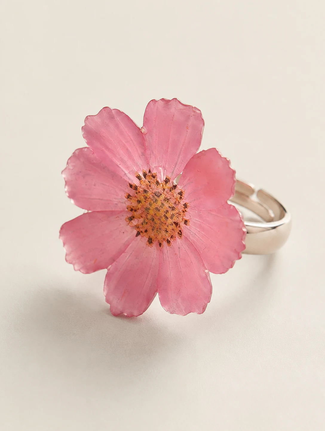 Gradient Pink Petal Ring — complete product view on a warm ivory background