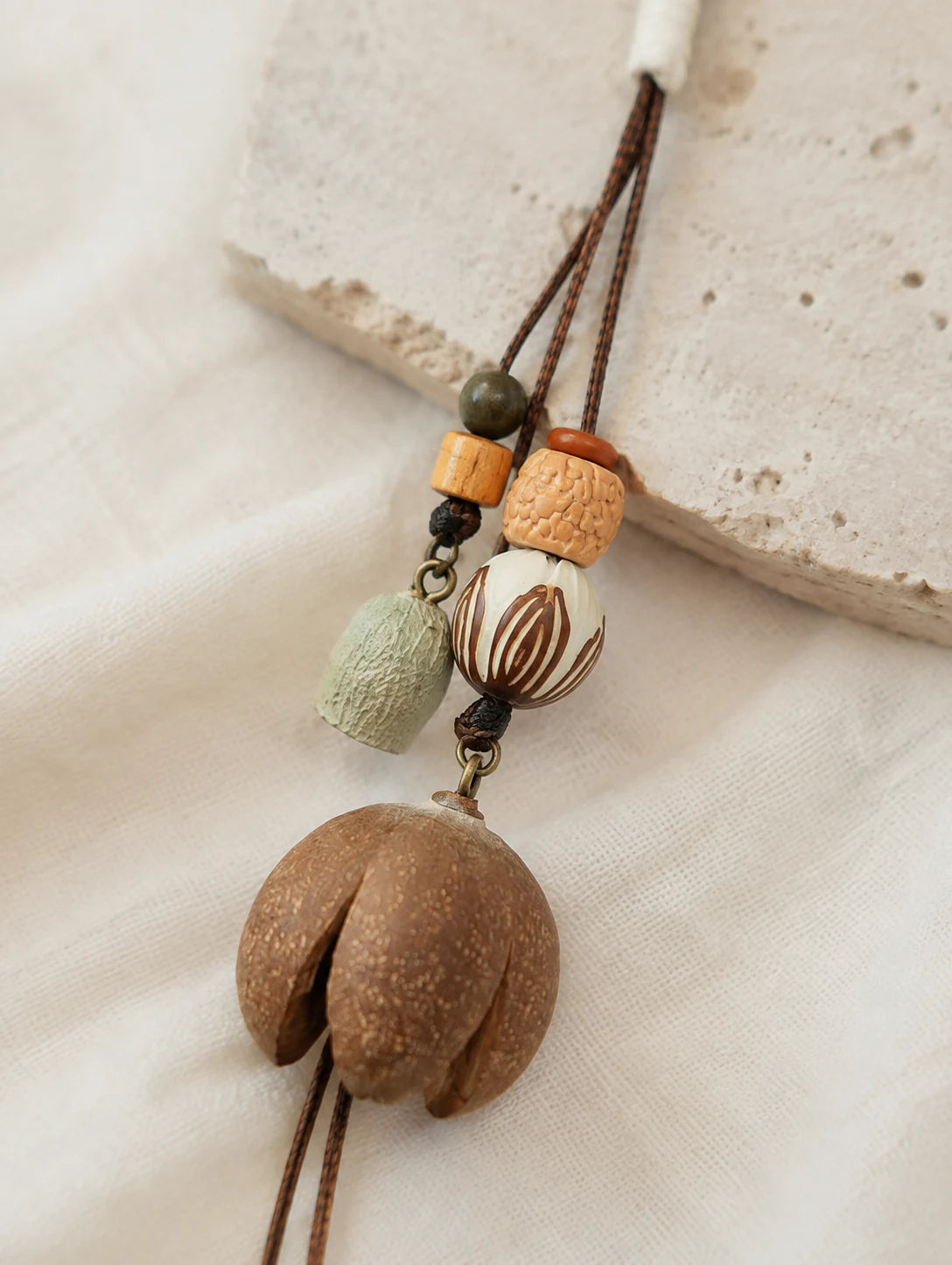 Round Woodland Pod Pendant Necklace — detail view