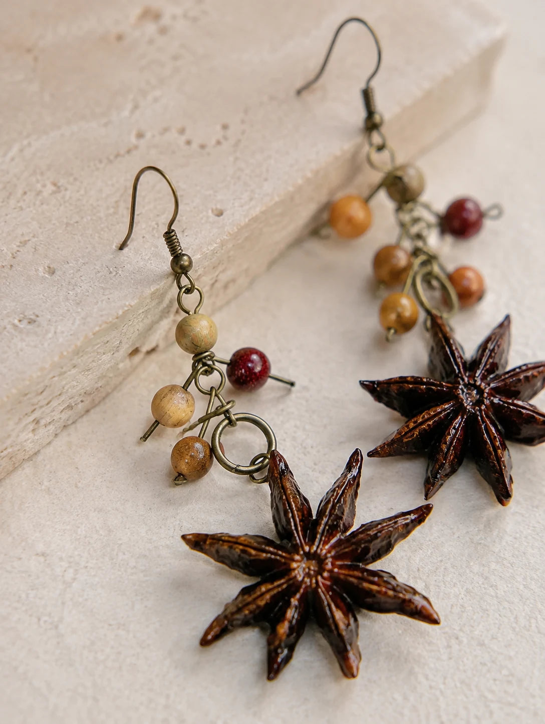 Star Pod Drop Earrings — detail view