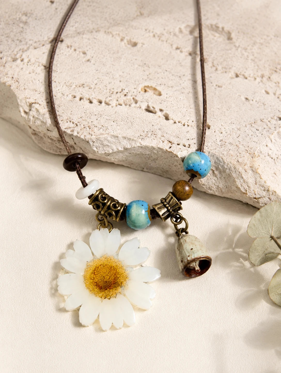 White Petal Token Necklace — close detail view