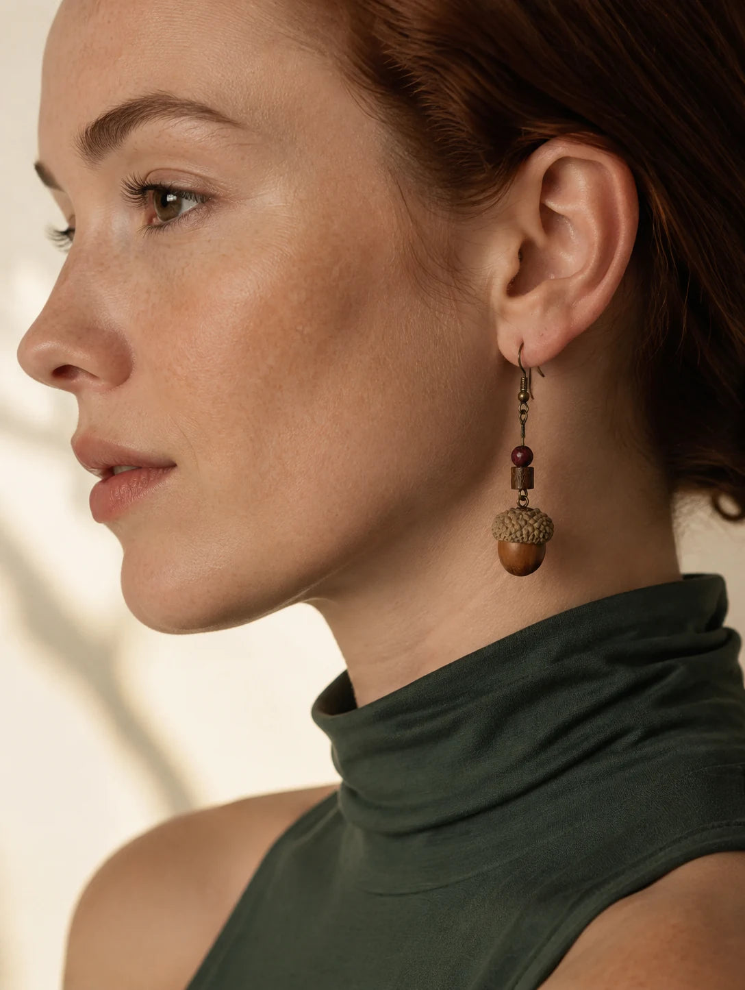 Editorial model styling the Woodland Seed and Bead Earrings