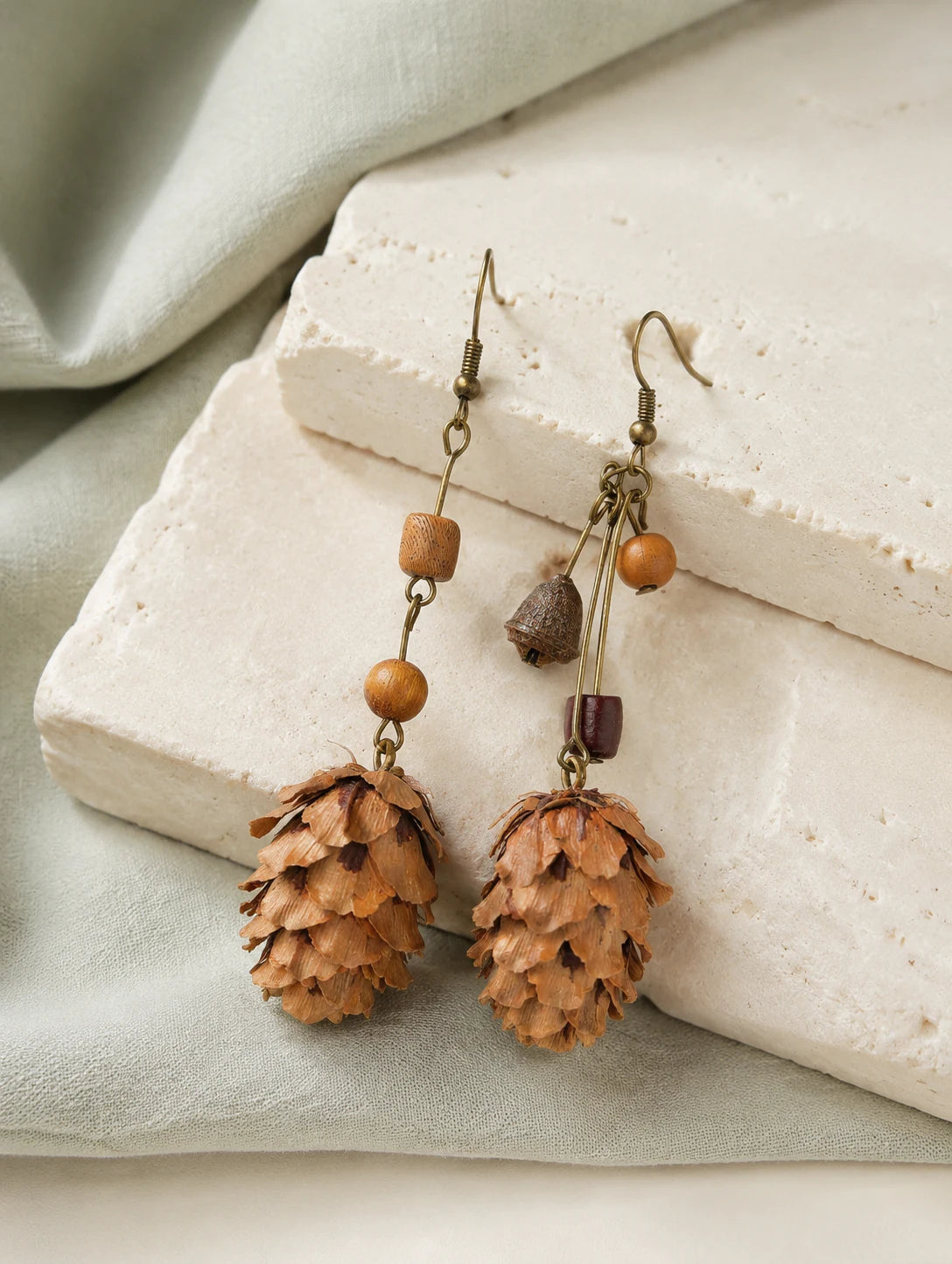 Asymmetrical Woodland Cone Earrings — styled view