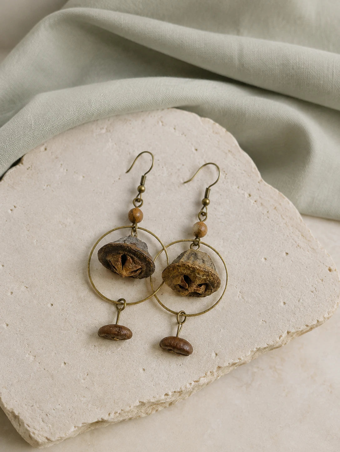 Bell Pod and Bean-Silhouette Earrings — styled view