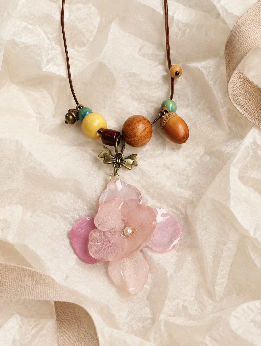 Blush Petal Cluster Necklace — unbranded gift-context still life
