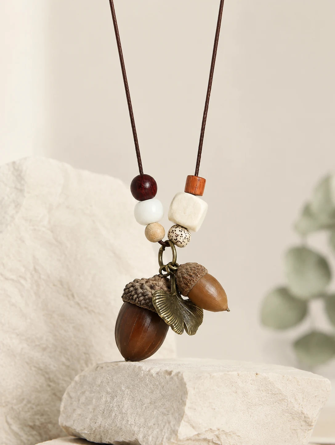 Brown Acorn-Silhouette Necklace — close detail view