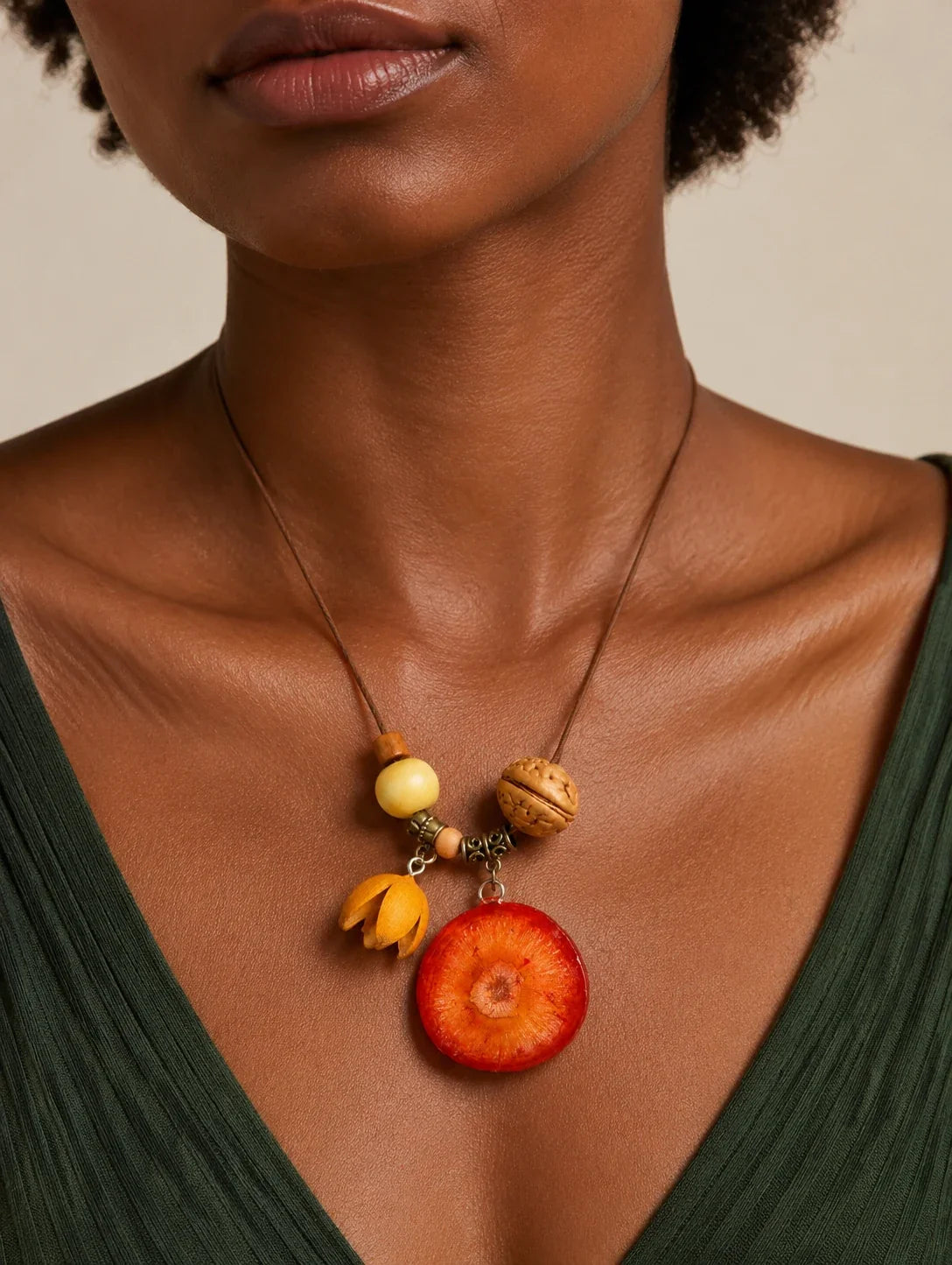 Editorial model styling the Deep Orange Slice Necklace