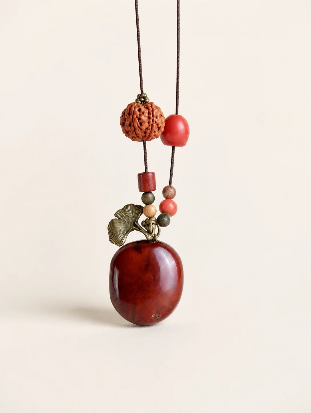 Deep Red Seed Pendant Necklace — second product angle