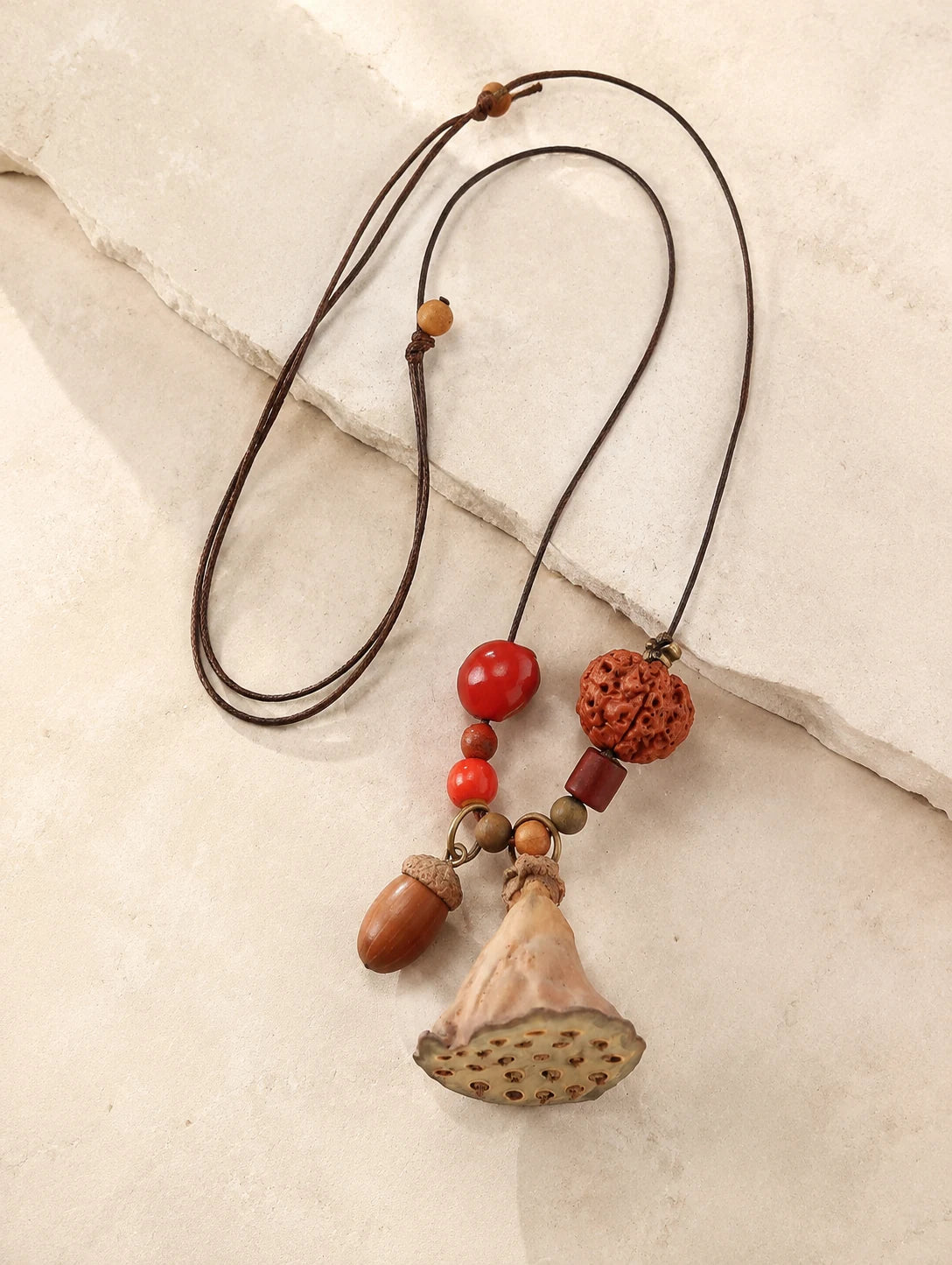 Fan Pod and Acorn Necklace — close detail view