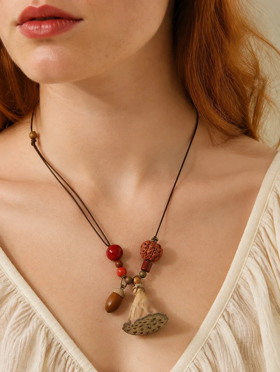 Editorial model styling the Fan Pod and Acorn-Inspired Necklace
