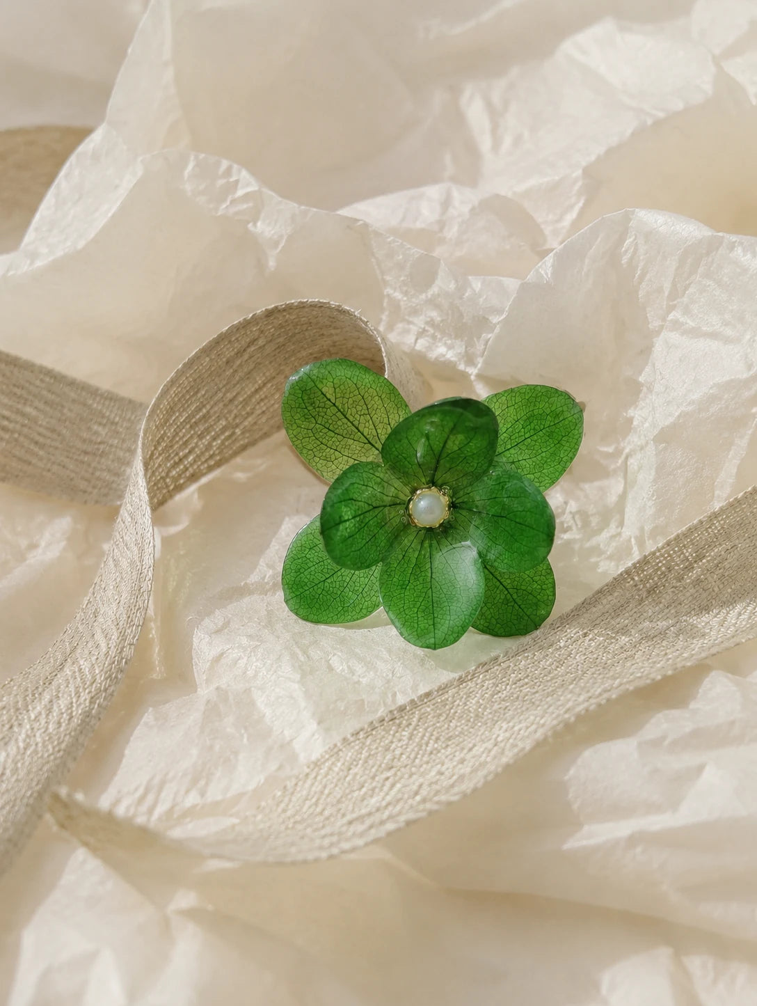 Forest Green Petal Cluster Ring — unbranded gift-context still life