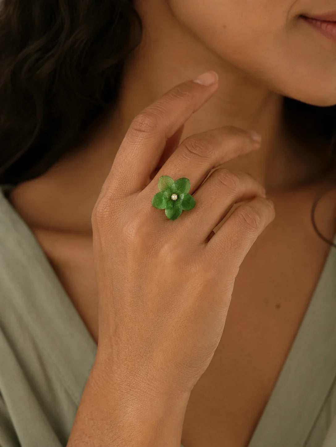 Editorial model styling the Forest Green Petal Cluster Ring