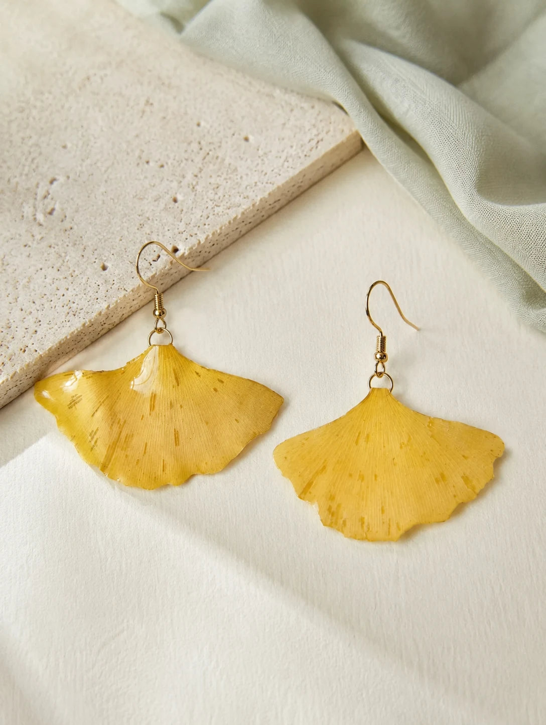 Golden Fan Leaf Drop Earrings — close detail view