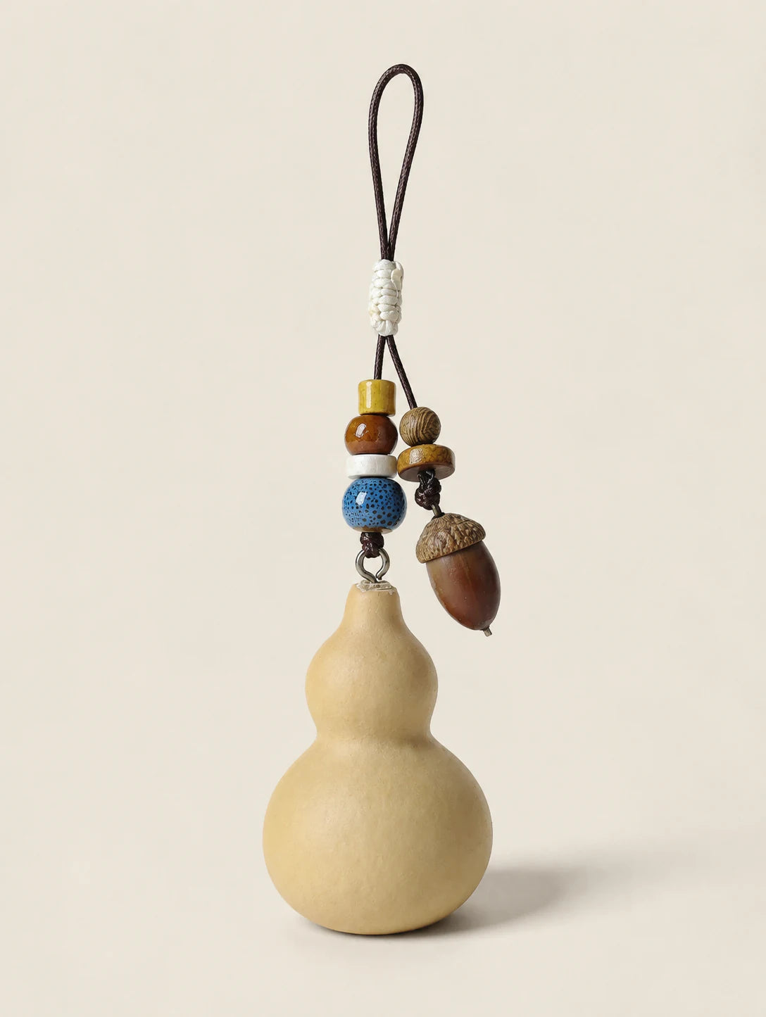 Gourd and Seed Phone Charm — alternate angle