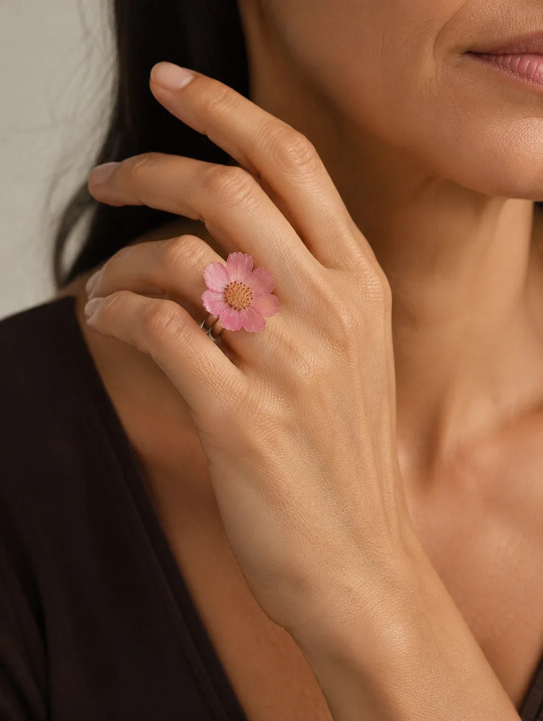 Editorial model styling the Gradient Pink Petal Ring