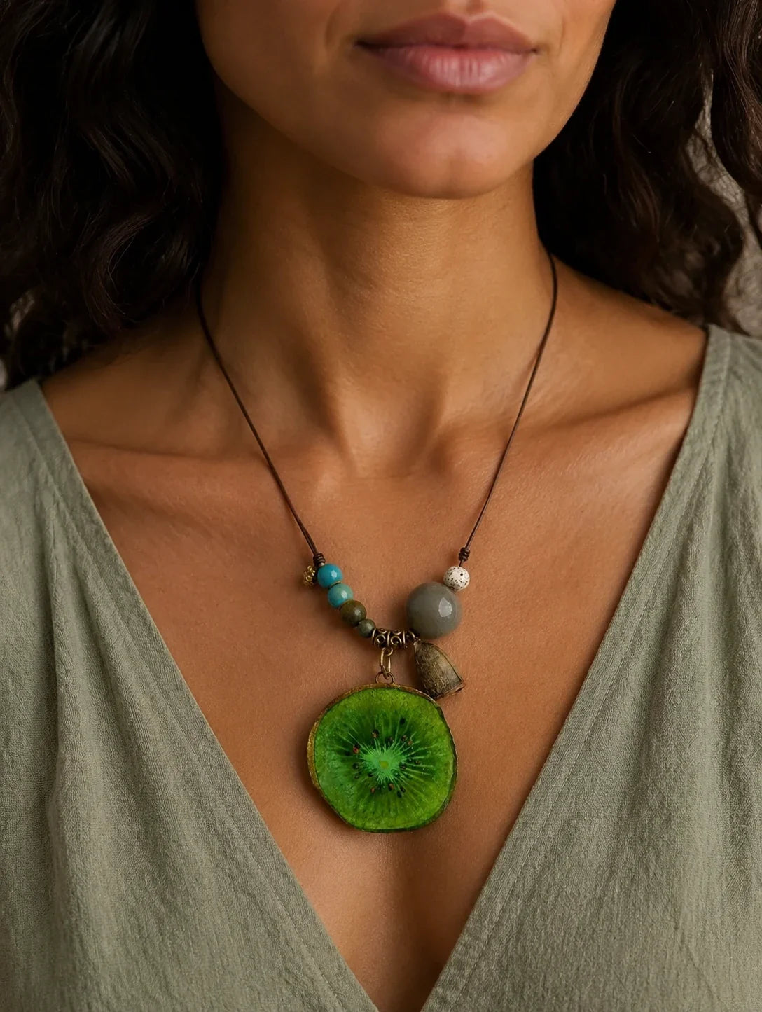 Editorial model styling the Green Slice and Bead Necklace