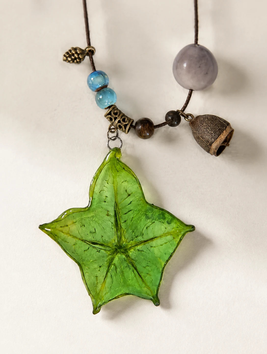 Green Star Slice Necklace — close detail view