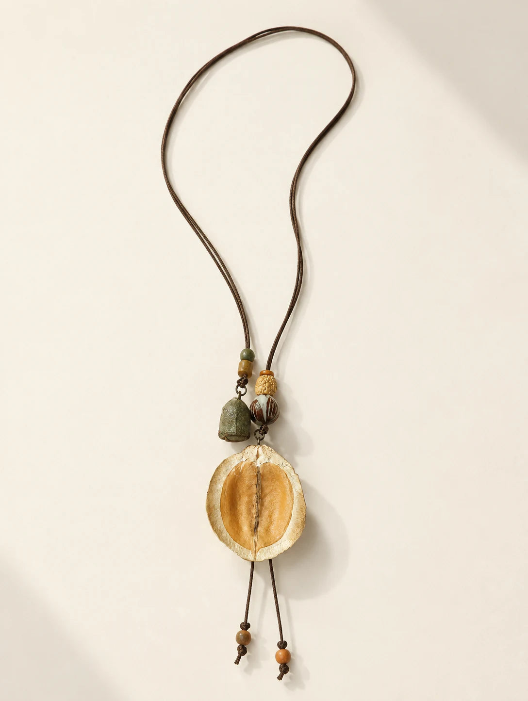 Curved Seed-Pod Pendant Necklace — hero view