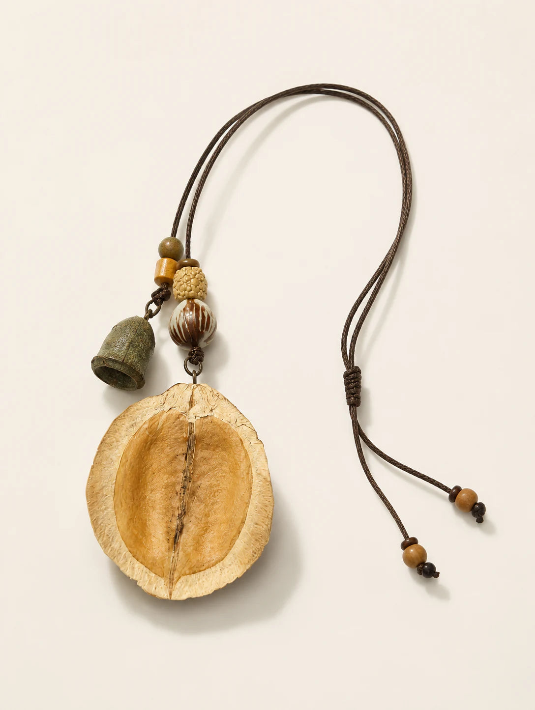 Curved Seed-Pod Pendant Necklace — alternate angle