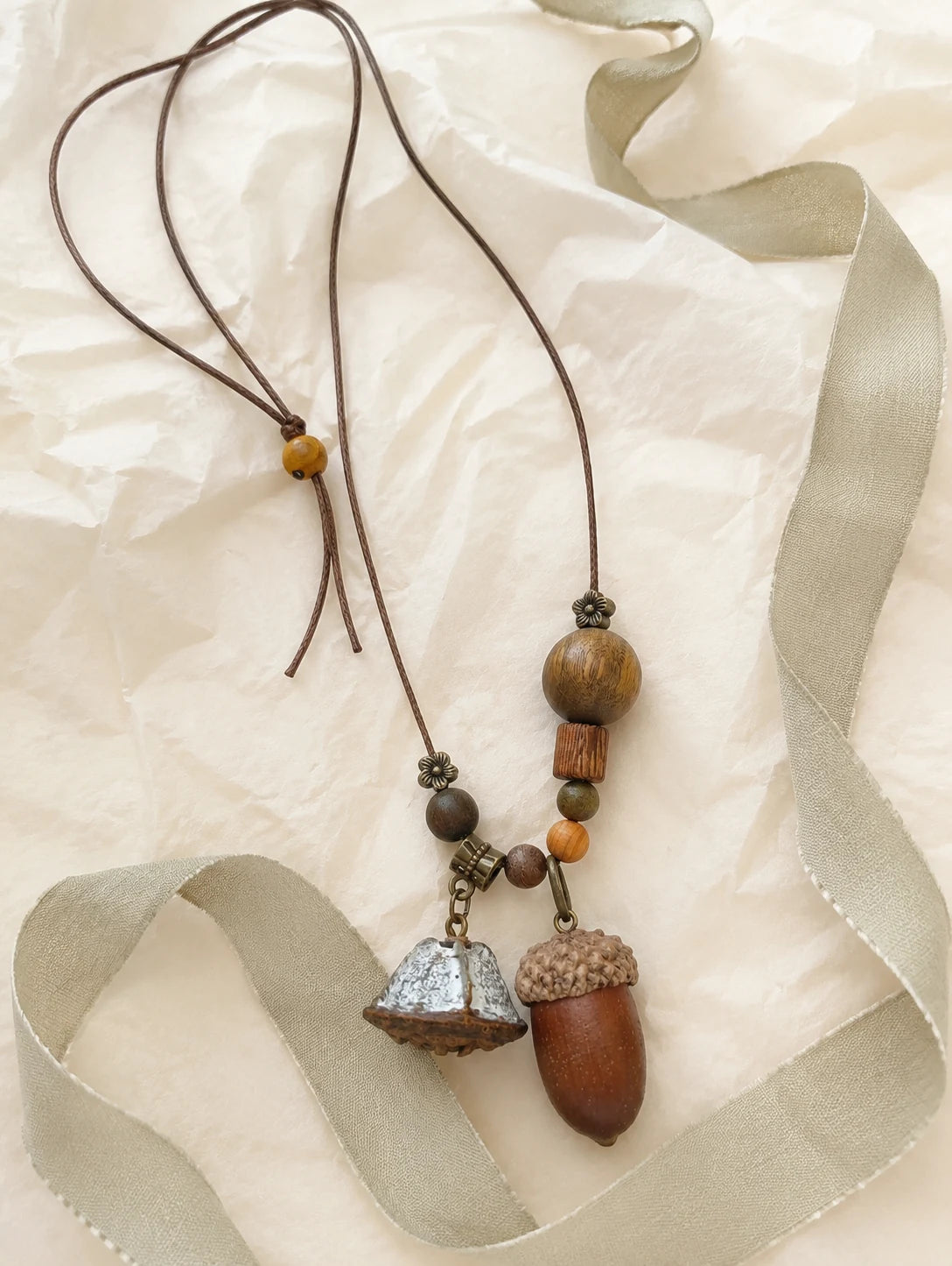 Long Acorn Cluster Necklace — unbranded gift-context still life