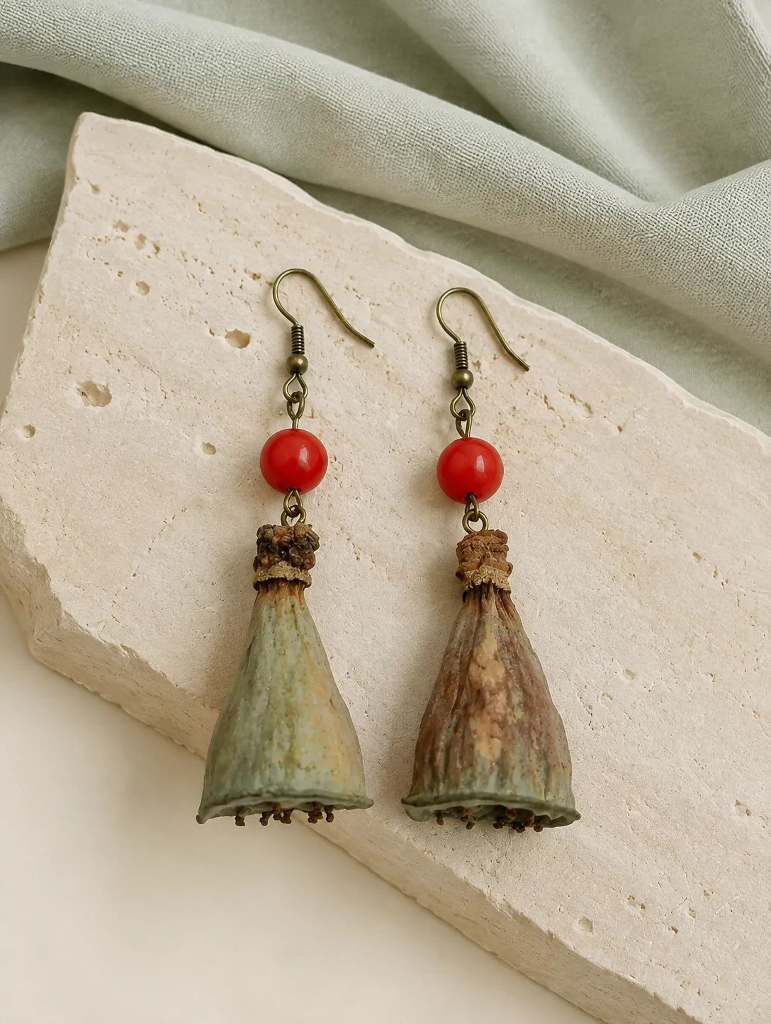 Seed-Pod and Red Bead Earrings — styled view