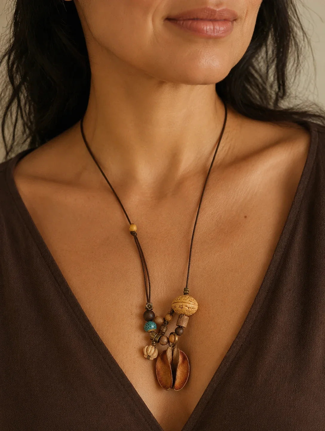 Editorial model styling the Mixed Woodland Token Necklace