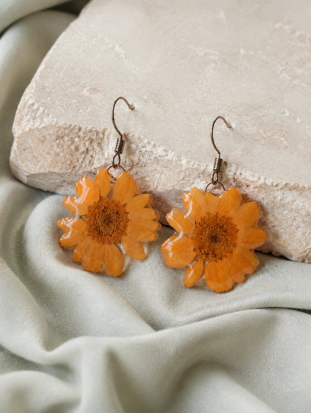 Orange Petal Drop Earrings — styled view