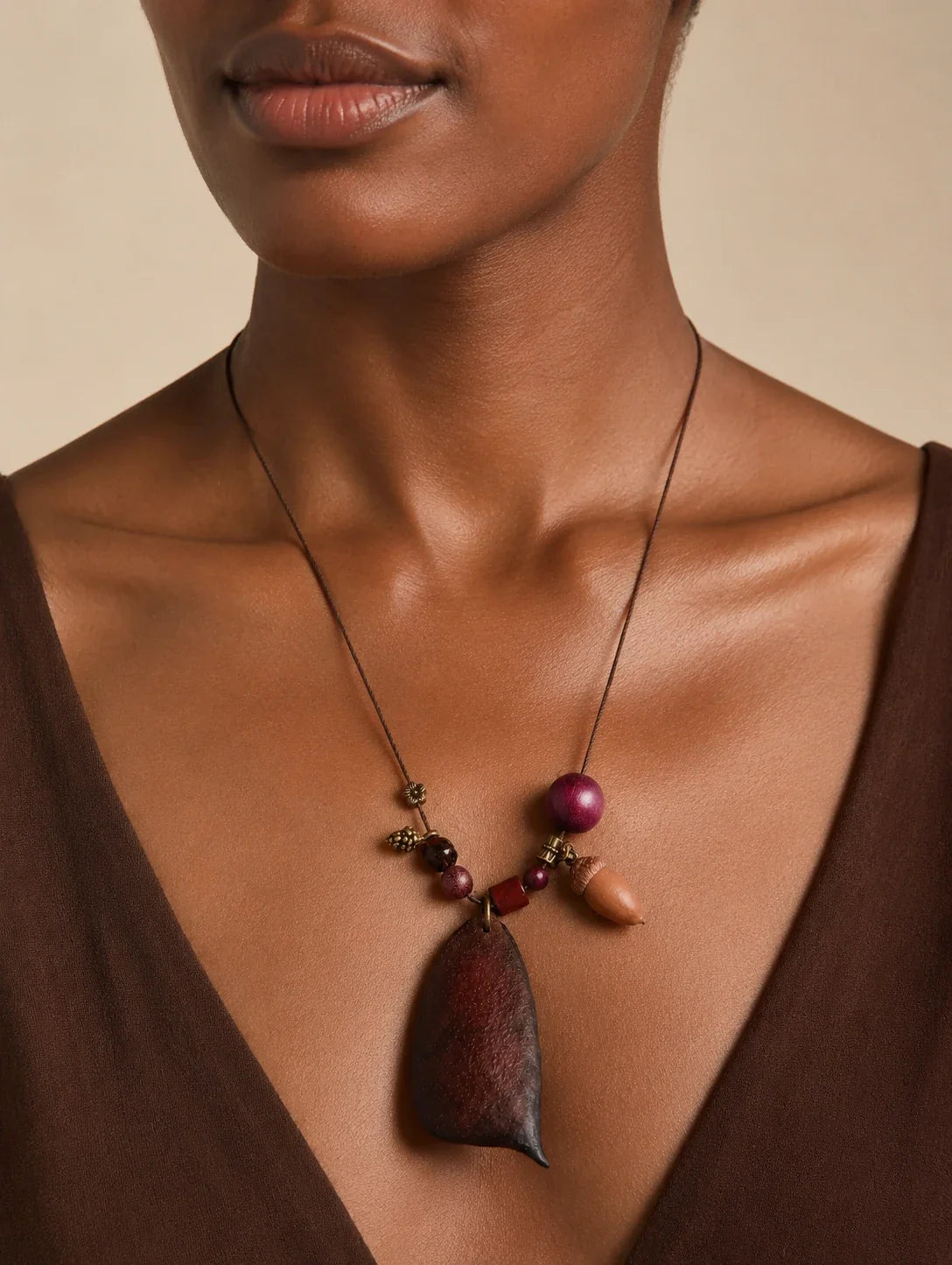 Editorial model styling the Seed-Pod and Acorn-Inspired Necklace