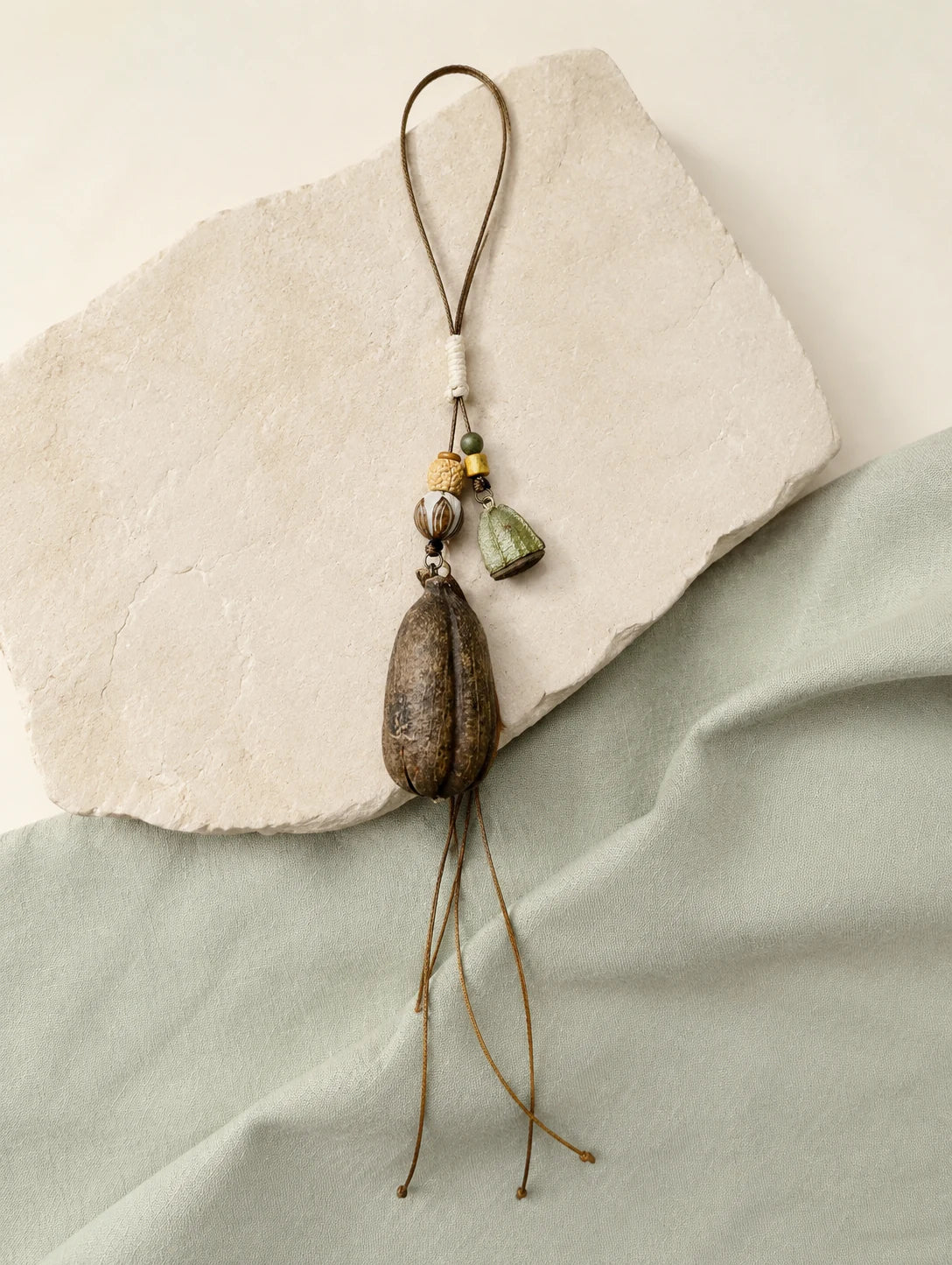 Textured Seed-Pod Pendant Necklace — styled view