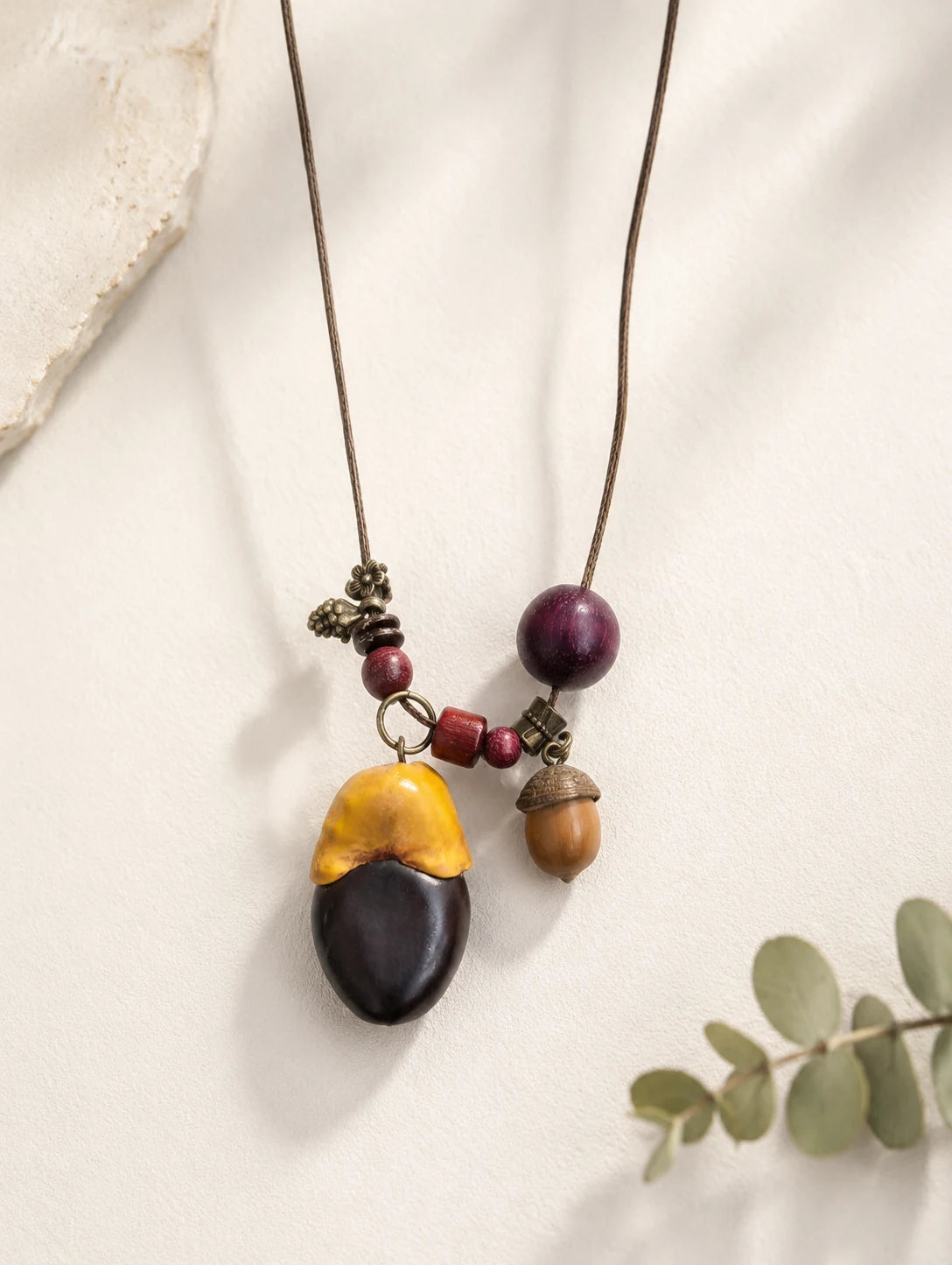 Two-Tone Seed Pendant Necklace — close detail view