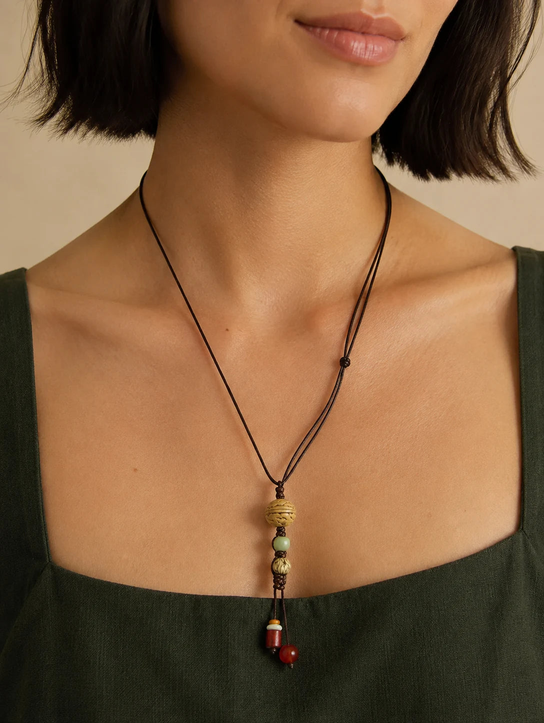 Editorial model styling the Textured Woodland Pendant Necklace