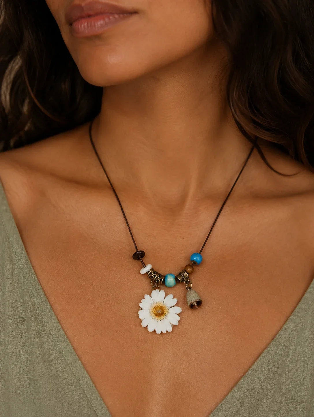 Editorial model styling the White Petal Token Necklace
