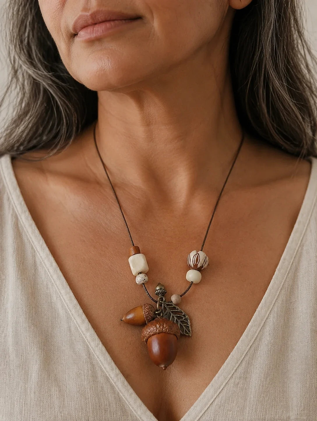 Editorial model styling the Woodland Acorn-Inspired Cluster Necklace